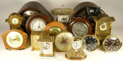 A collection of mid 20th century and later clocks, to include mantel clocks, carriage clocks, desk