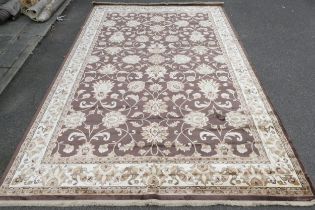 An Antigua art silk brown and cream ground floral carpet, 280 x 420cm, ex stock.