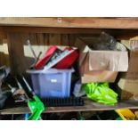 A shelf of garage tools