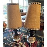 A pair of mid 20th century German ceramic 'larva' table lamps, with original shades. (2)