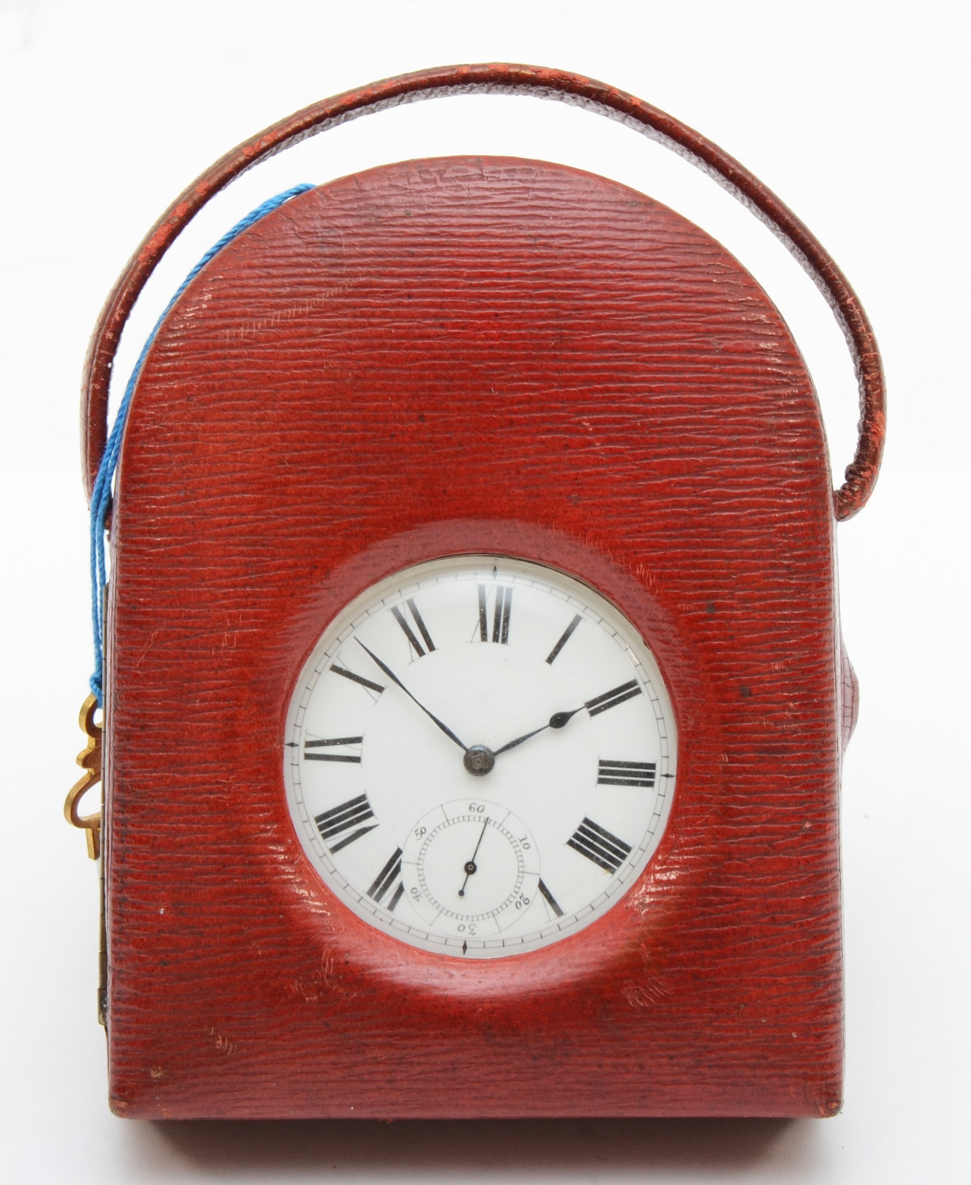 A silver Waltham key wound pocket watch, Birmingham 1883, diameter 5cm, with a red leather traveling
