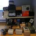 A substantial collection of primarily vintage projectors.