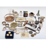 A group of mixed electroplated silver to include an Edwardian bottle coaster, salts, spoons, coins