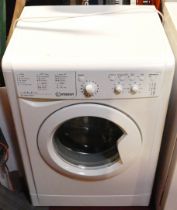 An Indesit A+++ Class washing machine, model number IWC 71252.