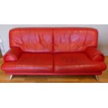 A modern red leather three seater sofa, L-186, H77 cm.