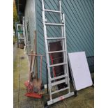A Youngmans 200 set of ladders with work platform and other garden tools