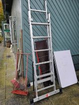 A Youngmans 200 set of ladders with work platform and other garden tools