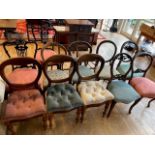 A set of harlequin mahogany chairs.