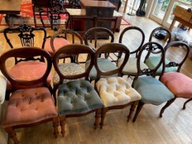 A set of harlequin mahogany chairs.