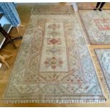 An Ikea Turkish Milas wool carpet, 200x300cm, together with a smaller example, 200x80cm. (2)