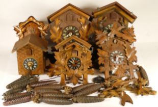 A collection of six mid 20th century and later cuckoo clocks, for spares or repair.