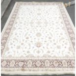 A Modern cream and brown ground floral carpet, 430 x 278cm, ex stock.