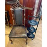 A Victorian mahogany hall chair with barley twist supports and a lacquered three tier cake stand.