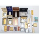 A collection of mid 20th century and later pocket cigarette lighters, petrol and gas operated,