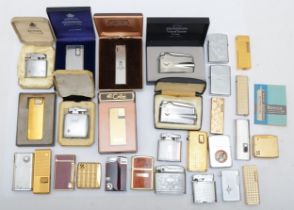 A collection of mid 20th century and later pocket cigarette lighters, petrol and gas operated,
