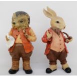 Two large Beatrix Potter figurines, 46cm tall.