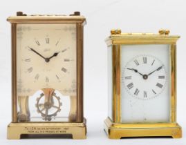 Two brass cased 8 day carriage clocks.