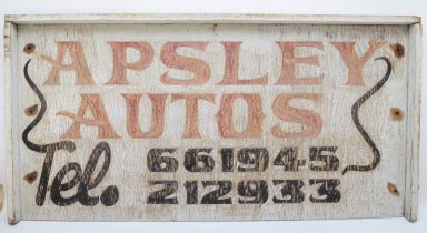 A painted wood advertising sign, Apsley Autos, 122 x 61cm