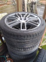 A set of four 18" alloy wheels with virtually new tyres. Goodyear Eagle F1. Size 235 40 18 95 Y.