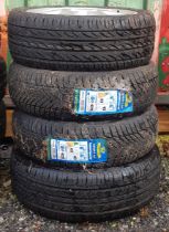 A pair of Imperial tyres, size (185/60R15) with a WP example, size 205/55R16 and a alloy wheel