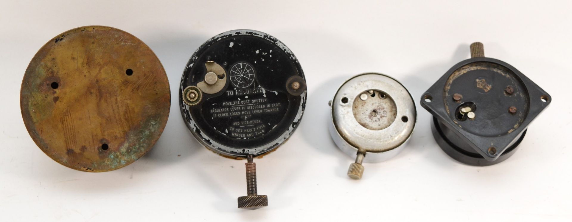 A group of four 20th century dashboard clocks comprising Smiths of London, the black dial with white - Image 2 of 2