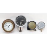 A group of four 20th century dashboard clocks comprising Smiths of London, the black dial with white