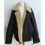 A 20th century brown sheepskin and fur lined jacket, hat and matching pair of gloves