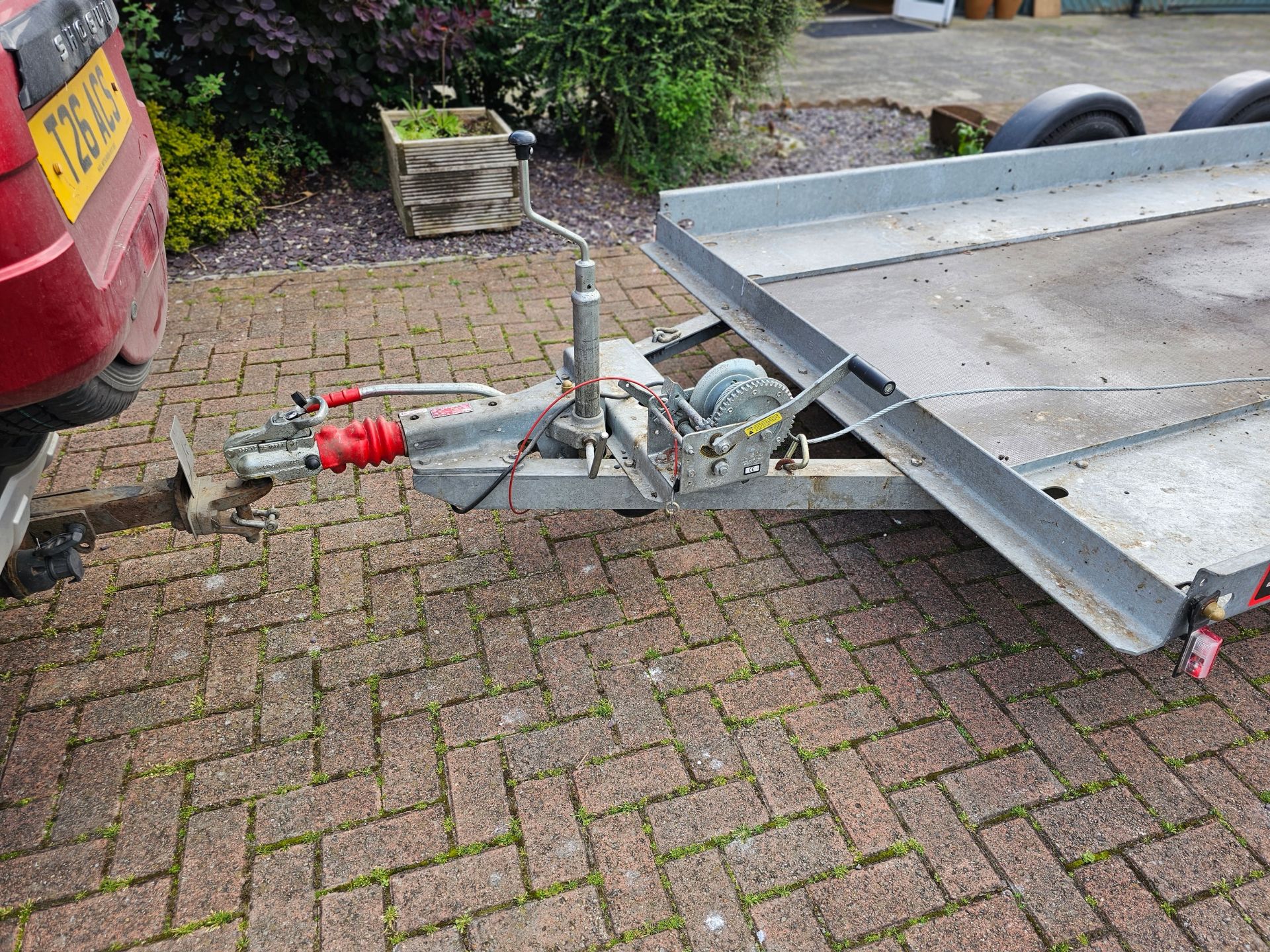 A Brian James, twin axle car trailer, up to 2700KG, with two ramps, manual winch and spare wheel. - Image 4 of 7