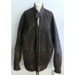 A brown sheepskin and fur lined gentlemens jacket, size large