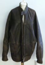 A brown sheepskin and fur lined gentlemens jacket, size large