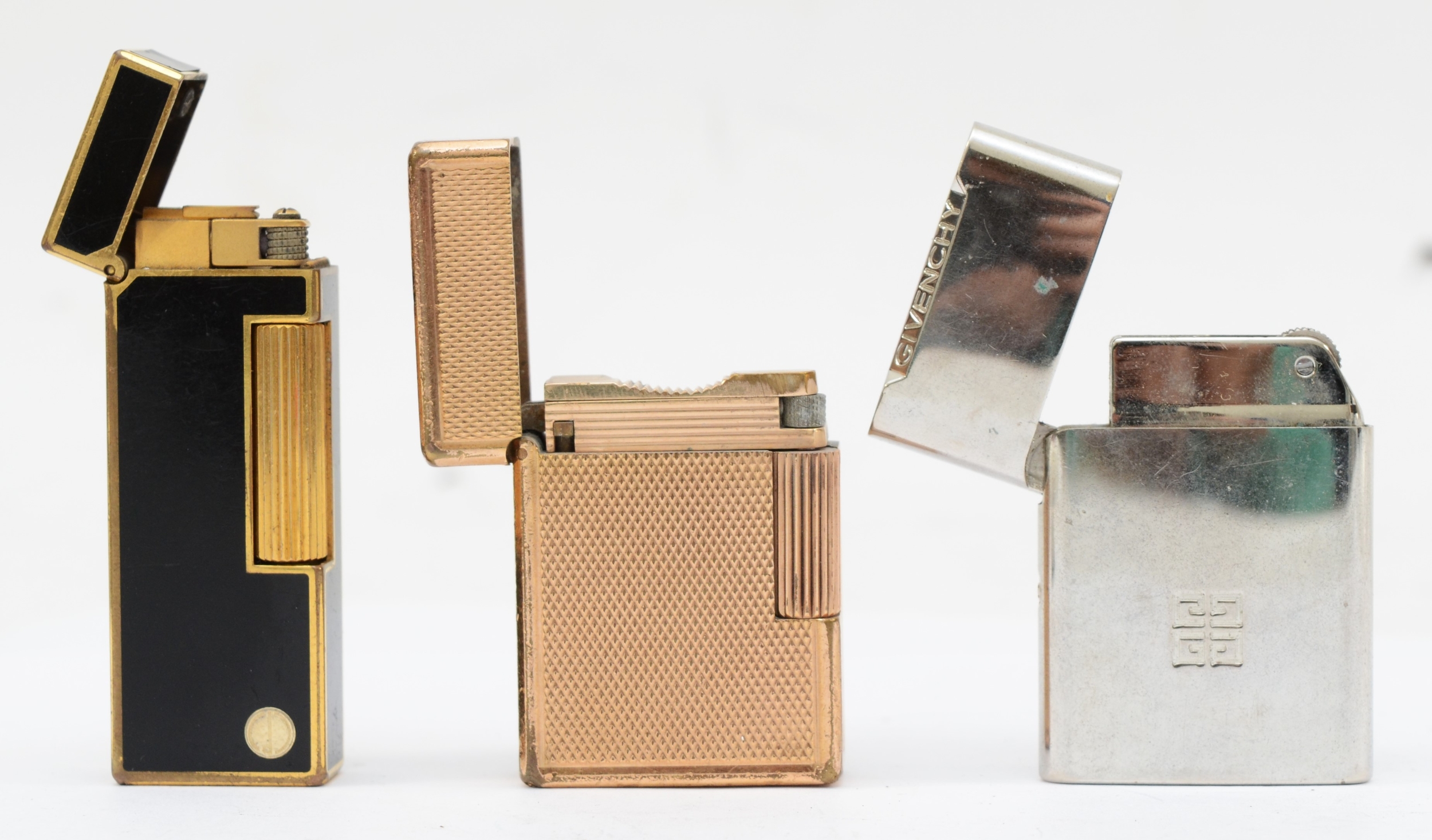 Dunhill, A black and gold plated rectangular gas lighter, 6.5cm, together with a Dupont french - Image 2 of 4