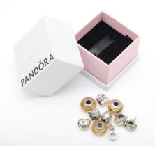 Pandora, ten silver charms to include an Easter bunny example, 34gm.
