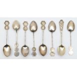 A Chinese set of six tea spoons, stamped silver, Hong Kong, and two other examples, 60gm.