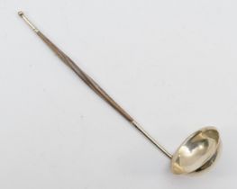 A Georgian silver toddy ladle, 8cm, with twisted handle.