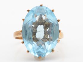 A 9ct gold blue paste stone cocktail ring, M, 4.3gm.