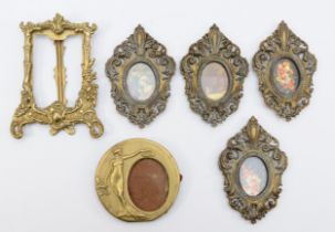 A group of brass photograph frames, one styled as an easel, 11 x 9cm.