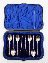 An Edward VII silver Apostle spoons and sugar tongs, Sheffield 1907, 96gm, cased.