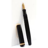 Parker, a black bodied Duofold fountain pen with 14k nib, 13cm.