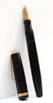 Parker, a black bodied Duofold fountain pen with 14k nib, 13cm.