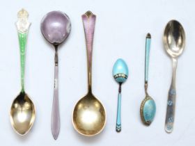 A Norwegian silver gilt and purple enamel spoon by David Anderson, and five other enameled