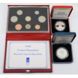 A 1990 Royal Mint United Kingdom proof coin set, a cased silver proof 1990 Sri Lanka 500 rupees, and