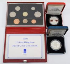 A 1990 Royal Mint United Kingdom proof coin set, a cased silver proof 1990 Sri Lanka 500 rupees, and