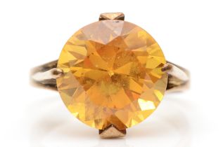 A gold synthetic yellow sapphire cocktail ring, O, 4.7gm, partially rubbed mark, believed to be