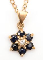 A 9ct gold briliant cut diamond and sapphire cluster pendant, 13mm, 2gm, on chain.