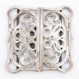 A Victorian silver Nurses belt buckle with foliate scroll decoration, 6.5 x 6.5, Birmingham 1900,