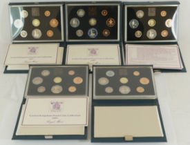 Four Royal mint 1983 proof coin sets, together with a 1984 example.