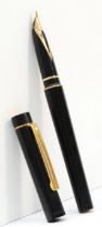 Sheaffer USA, a black bodied fountain pen with 14k gold nib, 13.5cm.
