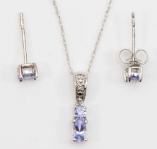 A 9ct white gold tanzanite and diamond pendant, 14mm, on chain, with matching ear studs, 1.5gm.