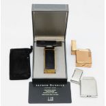 Dunhill, A black and gold plated rectangular gas lighter, 6.5cm, together with a Dupont french