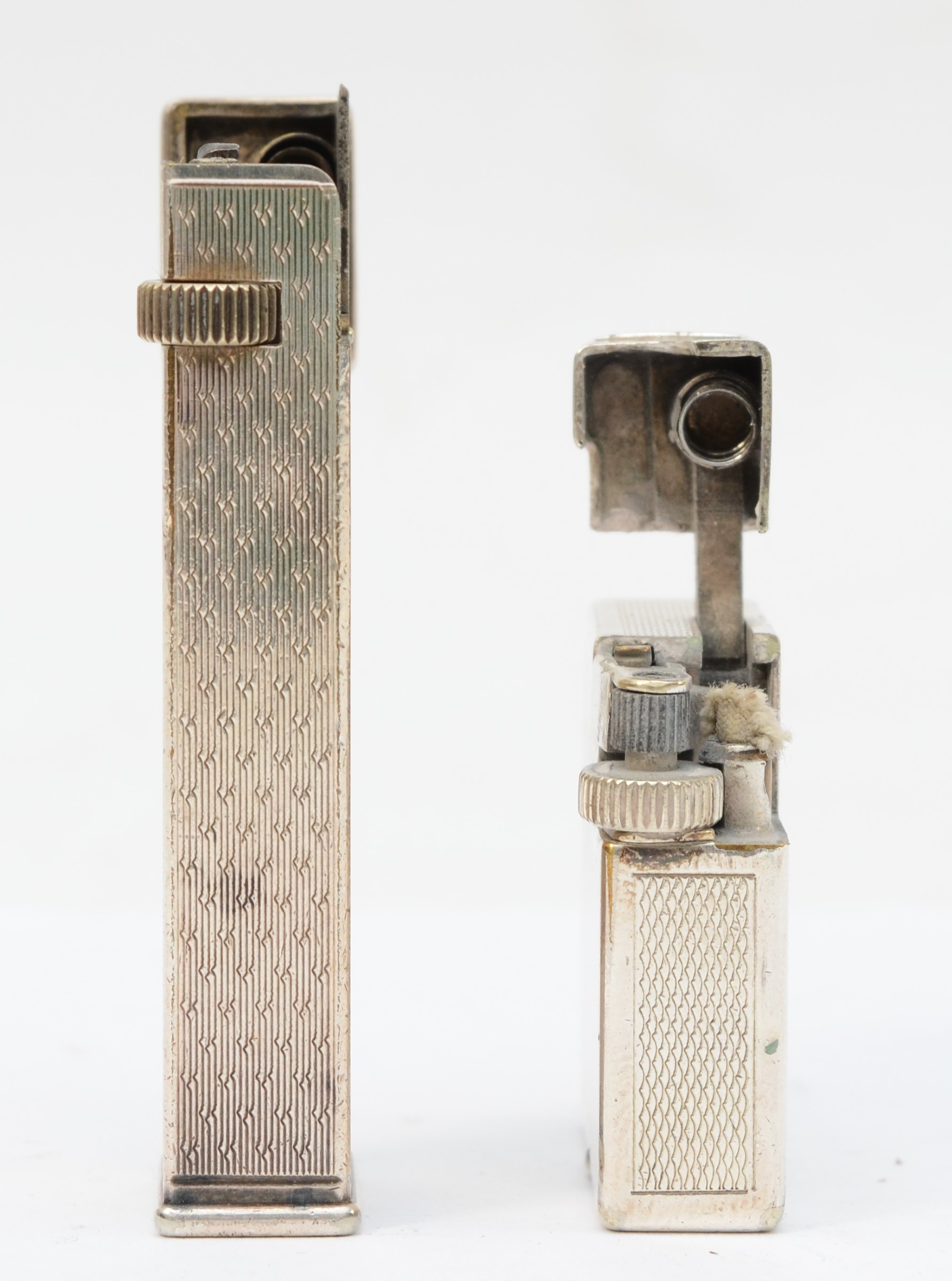 Dunhill, A silver plated petrol 'Cartier-Licence' rectangular lighter, 6.5cm, together with - Image 2 of 4